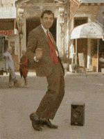 爱跳舞的gif-rowan atkinson dancing GIF